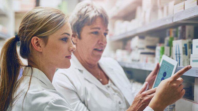 two pharmacy professionals working together in the pharmacy